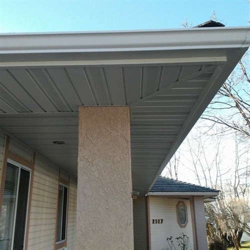 Custom bent metal fascia, metal soffit and new gutters
