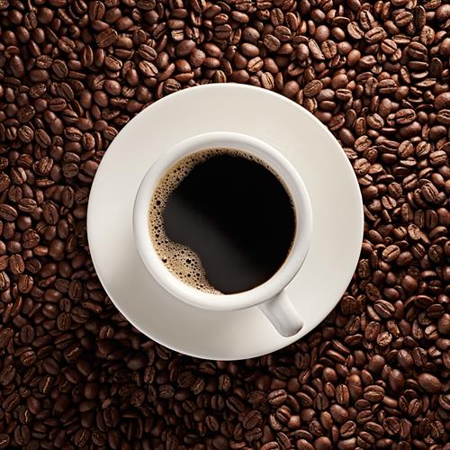 Gallery Image overhead-coffee-cup-on-beans.jpg