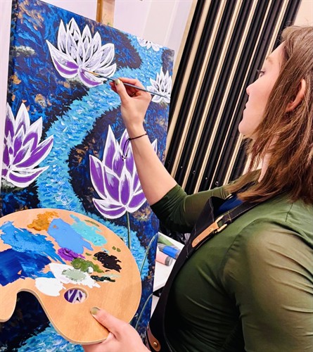 Painting live at a grief-related conference in Columbus, Ohio. As a community artist, Sarah Kundla periodically offers services as a live event painter at professional events around Ohio.