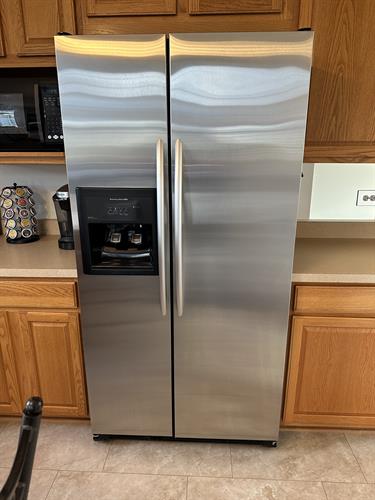 After: Gleaming like new, the refrigerator now sparkles and is radiant and refreshed