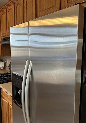 After: Sparkling clean and streak-free—like a brand-new fridge reborn