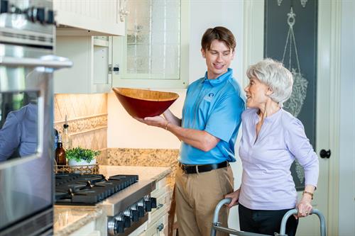"Thank you, I can never reach that bowl." We are happy to help in the kitchen.