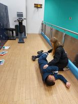 Placing a casualty into the recovery position