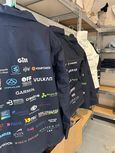 Waterproof marine jackets with multiple sponsor logos