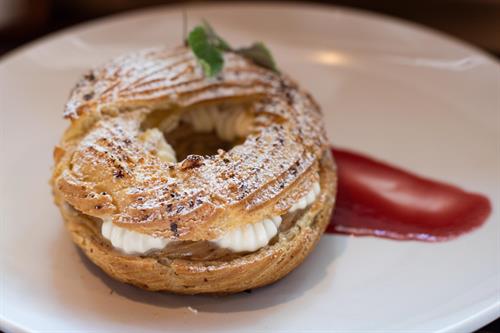 Hazelnut Paris Brest with plum sauce