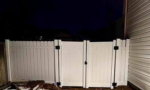 New vinyl fence with double gate