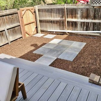 New patio, landscaping, and gate