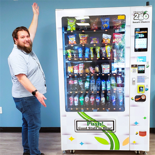Owner/Operator Adam with our customizable food+drink refrigerated vending machine. Owner/Operator Adam with our customizable food+drink refrigerated vending machine.