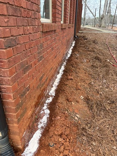 Trenching for termite treatment