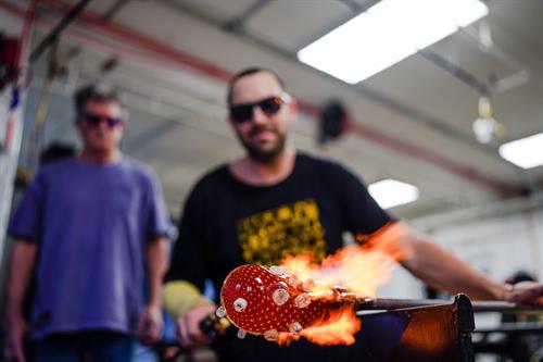 Glassblowing instructors in the Waterfall Arts Glassworks Studio