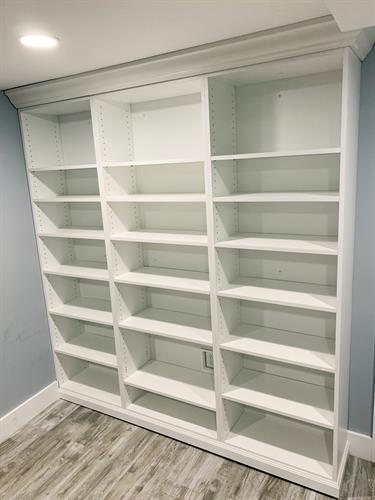 A built-in bookcase will fit perfectly in your space.