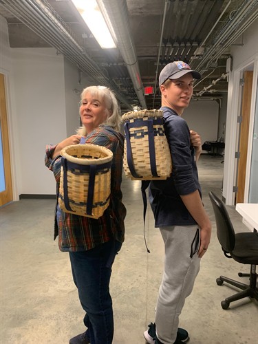 Mother and Son making baskets together