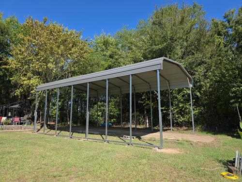 Regular roof rv cover w/ concrete supports 