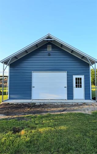 24x35x10 with a Pitched roof  14/29 Gauge ( upgrades available upon request ) 