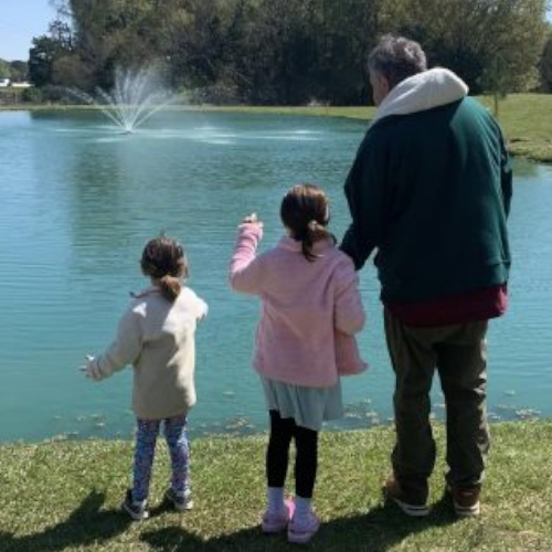 Family-friendly pond with fountain views – a peaceful place to relax and make memories together.