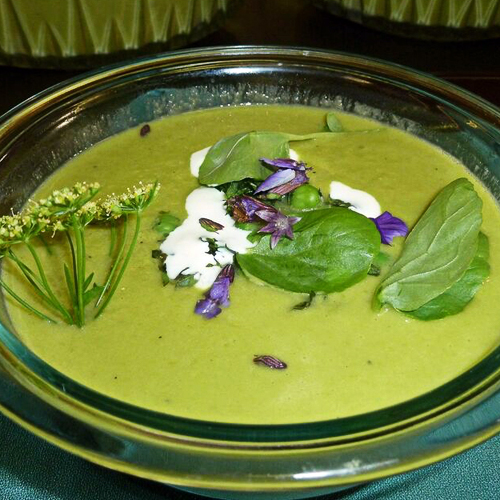 Fresh veggie bisque with local herbs and edible flowers.