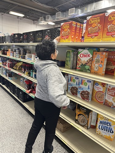 WFCM client selecting cereal.