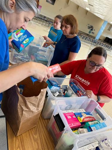 Members packing food 