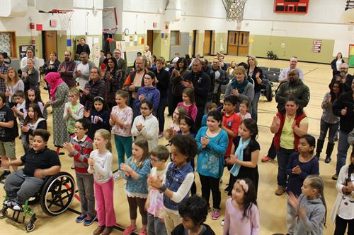 Parents having fun during our bucket drumming concert 