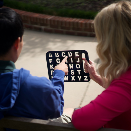 Spelling to Communicate (S2C™) empowers nonspeakers to overcome communication barriers posed by traditional oral communication by pointing to letters on a board as an alternative means of communication. 