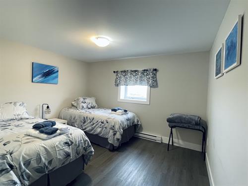 Cape Freels Room (single or King setup available; private ensuite)