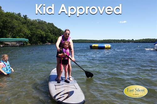 Paddle boarding is one of our many kids activities and the kids love it. 