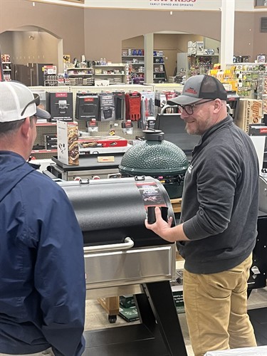 John talking grilling/smokers with customer