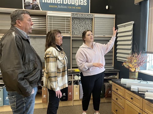 Nichole discussing window treatments