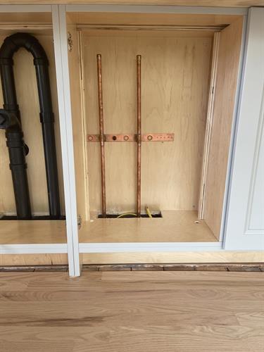 Kitchen sink loop vent and water lines with air chambers