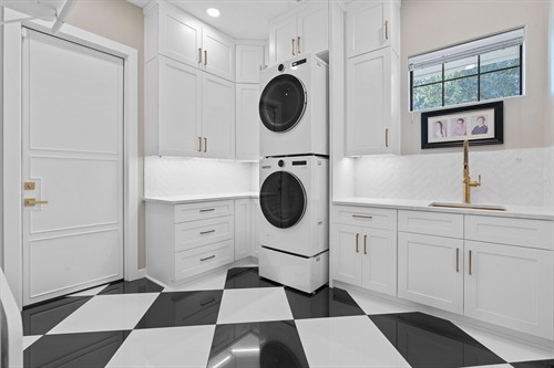 Fully custom laundry room project which included relocating the staircase 