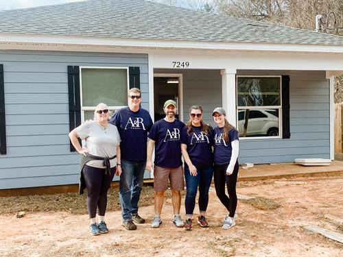 Some of the A&R team volunteering at Habitat for Humanity