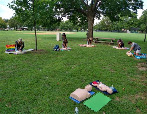 Family CPR training in their backyard