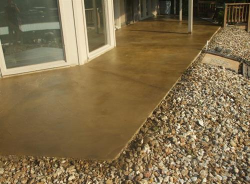 A concrete stained patio we did, the color is bark brown and then we applied sealer