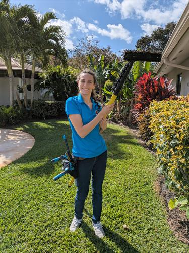 Letizia with her window cleaning tools ready in Palm Bech Gardens.