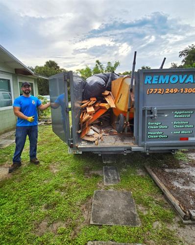Eric removing construction debris