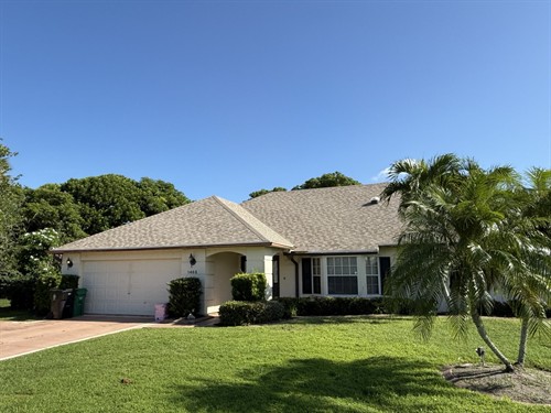 Residential shingle roofing project completed by SpearTip Roofing in South Florida.