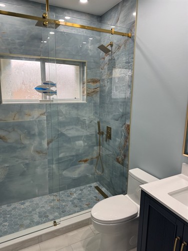 Gallery Image blue-onyx-shower-and-navy-vanity-wide-view.jpg