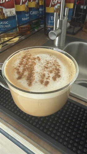 Hot latte with cinnamon 