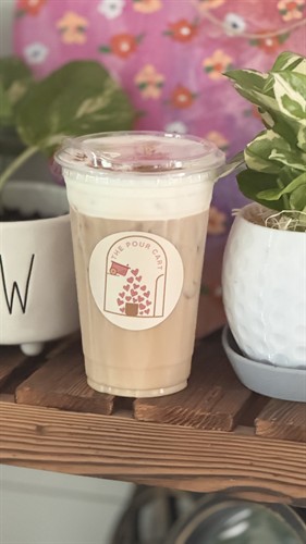 Specialty flavored iced latte with vanilla cold foam