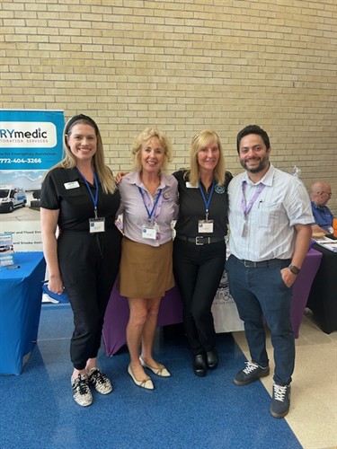 Business to Business Expo Collaboration Kim Miller, Director of Marketing and Allan Murillo, Care Coordinator, Stuart, join the MDVIP Team for a picture