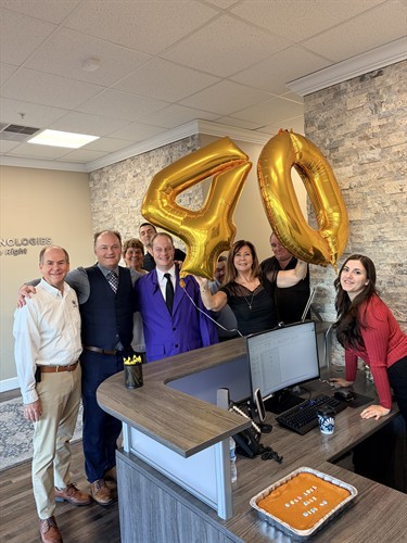 The C&W Team celebrating 40 years of business