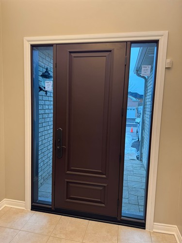 Modern brown front entry door with decorative glass sidelights, professionally installed by EcoTech Windows & Doors for security, insulation and curb appeal.