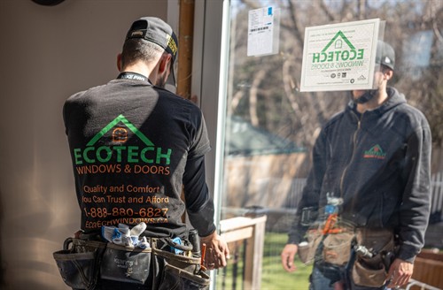 EcoTech installation professionals fitting a replacement window with precision to improve insulation, comfort and energy efficiency.