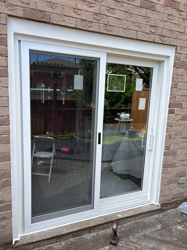 Energy-efficient sliding patio door installed by EcoTech Windows & Doors, providing Canadian homeowners with improved insulation, natural light and easy outdoor access.
