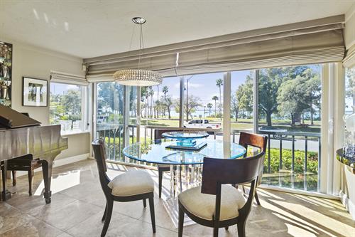 Gallery Image 555_S_Gulfstream_X101_Sarasota_FL_34236_Royal_St_Andrew._Dining_Room_with_bay_view._Frank_Ferrell_Realty_Inc._MLS_O6004512.jpg