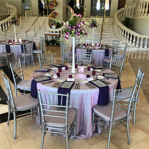 Elegant in every detail—our full-service team brought this purple-themed vision to life for a seated, chef-curated event.