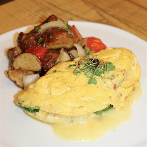 Enjoy our Bacon and Spinach Omelette every weekend during Brunch!