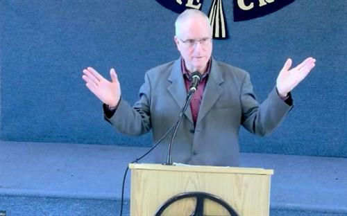 Speaking on "Solving the Roots of Conflict"