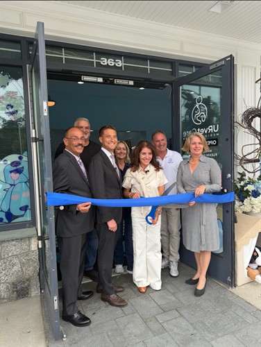 ribbon cutting at grand opening