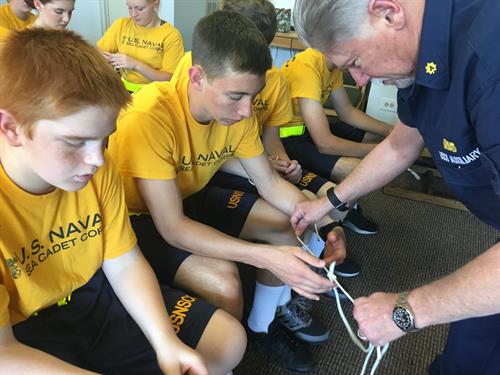 Seamanship training and learning to tie knots.